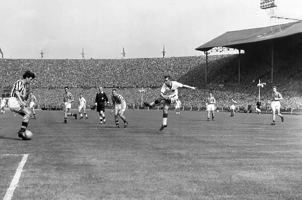Bobby Charlton shoots during the 1957 FA Cup Final