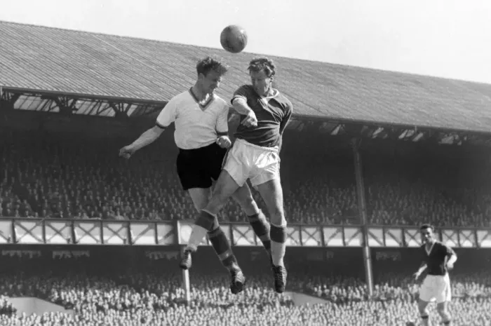 Framed Print : Evertons James Harris and Leeds Jack Charlton compete for a header Framed Print : Evertons James Harris and Leeds Jack Charlton compete for a header