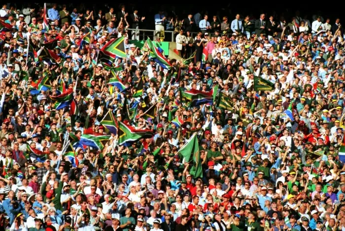 Framed Print : Fans wave the South African flag in the stands at Ellis Park during the 1995 Rugby World Cup Final Framed Print : Fans wave the South African flag in the stands at Ellis Park during the 1995 Rugby World Cup Final