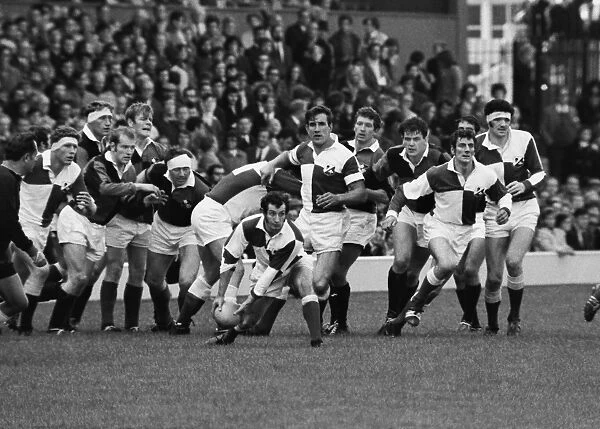 Gareth Edwards passes the ball out during the RFU Centenary Match in 1970