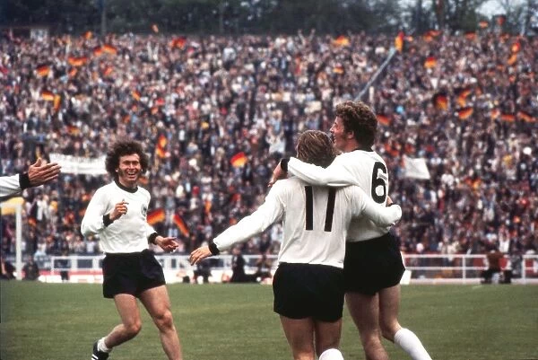 Herbert Wimmer celebrates his goal with his West German teammates in the final of Euro 72