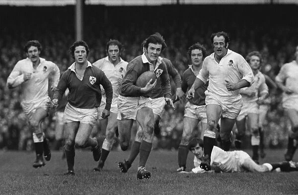 Irelands John Moloney makes a break against England - 1974 Five Nations