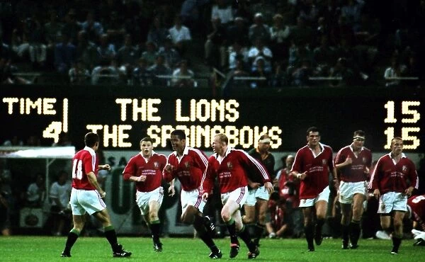 Jeremy Guscott celebrates scoring the series-winning drop-goal for the British Lions in 1997