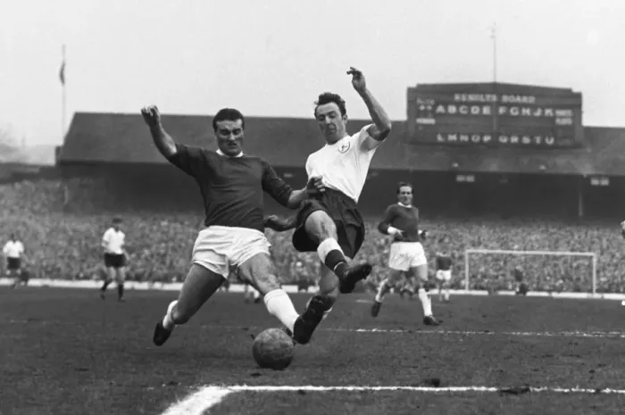 Framed Print : Jimmy Greaves and Noel Cantwell compete for the ball in the 1962 FA Cup semi-final Framed Print : Jimmy Greaves and Noel Cantwell compete for the ball in the 1962 FA Cup semi-final