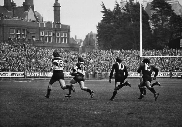 John Bevan runs with the ball for the Barbarians against the All Blacks in 1973