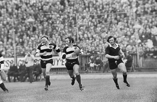 John Dawes makes a break in the build-up to the Barbarians famous try against New Zealand in 1973