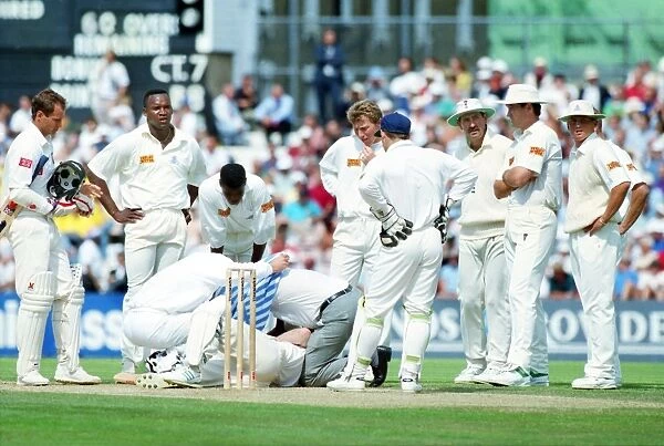Jonty Rhodes lies injured after being hit by a Devon Malcolm bouncer at the Oval in 1994