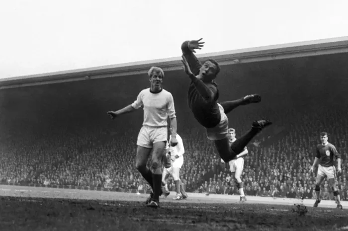 Framed Print : LArsenal goalkeeper James Jim Furnell dives for the ball as teammate Ian Ure looks on in 1964