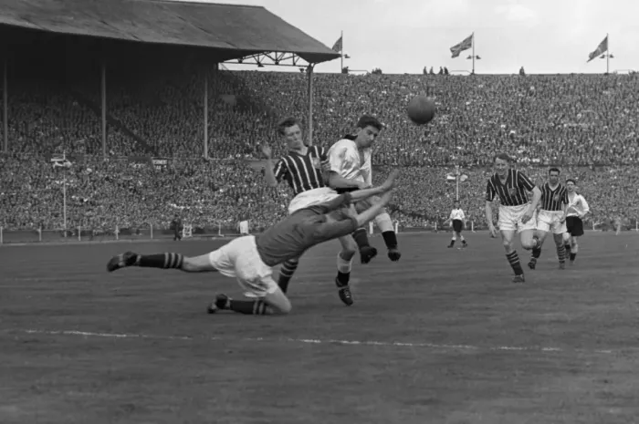 Framed Print : Manchester City goalkeeper Bert Trautmann makes a save - 1956 FA Cup Final