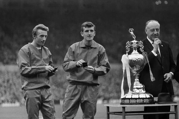 Manchester Uniteds Denis Law and Alex Stepney with their medals at the 1967 League trophy presentation at Old Trafford