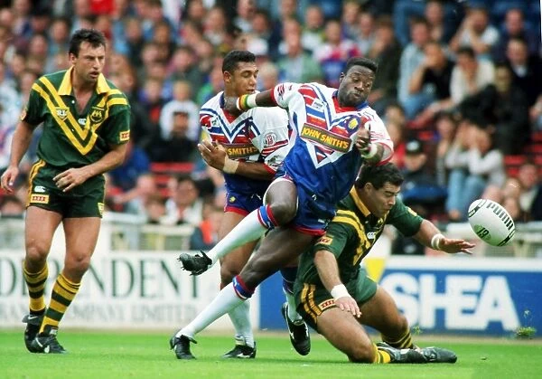 Martin Offiah. RUGBY LEAGUE. Martin Offiah (GB) chases the spilt ball.