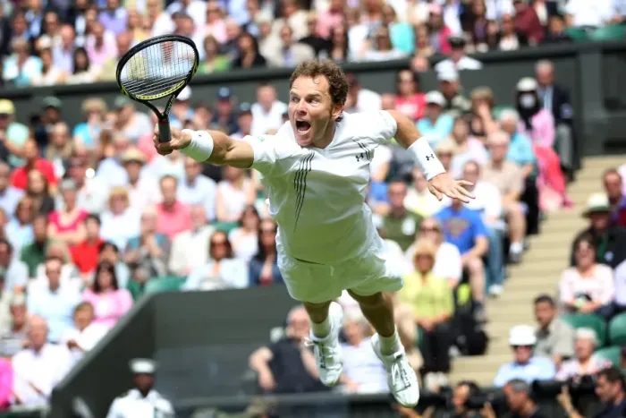 Framed Print : Michael Russell dives to return a shot during the 2011 Wimbledon Championships Framed Print : Michael Russell dives to return a shot during the 2011 Wimbledon Championships