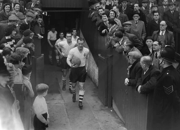 Nat Lofthouse leads Bolton out at Burnden Park in 1958