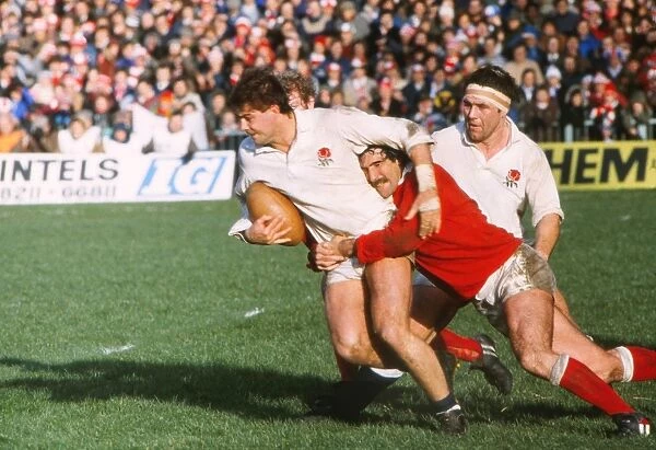 Nick Jeavons is tackled by Jeff Squire during the 1983 Five Nations