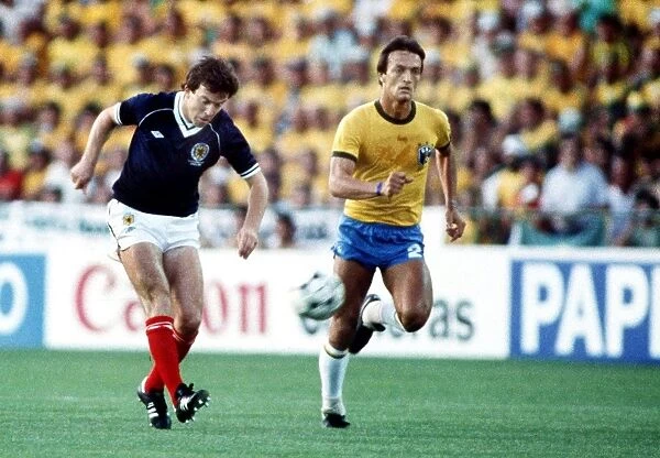 Scotlands John Robertson and Brazils Leandro at the 1982 World Cup