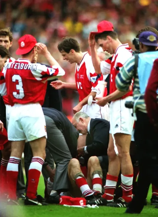 Framed Print : Steve Morrow lies injured after being dropped by Tony Adams during their 1993 League Cup celebrations