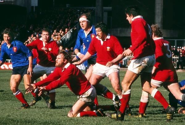 Wales Derek Quinnell passes the ball out against France - 1978 Five Nations