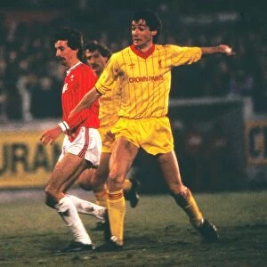 Alan Hansen and Kevin Summerfield suring the 1984 League Cup semi-final