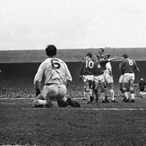 Alf Arrowsmith and his Liverpool teammates celebrate his goal against Manchester United in 1963 / 4