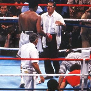 Angelo Dundee congratulates Muhammad Ali after The Greatest wins the World Heavyweight Title for a third time