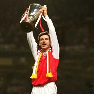 Arsenal goalscorer Alan Smith lifts the 1994 European Cup Winners Cup