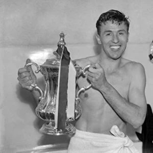 Aston Villa captain Johnny Dixon with the FA Cup in 1957