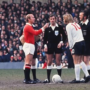 Bobby Charlton tosses the coin before his last home game for Manchester United