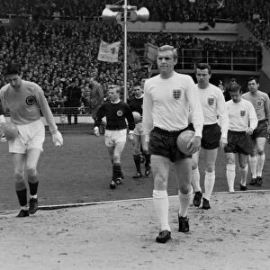 Bobby Moore leads England out against Scotland at Wembley in 1965