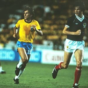Brazils Zico and Scotlands Alan Hansen during the 1982 World Cup