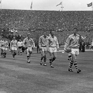 Burnley captain Jimmy Adamson leads his side out for the 1962 FA Cup Final