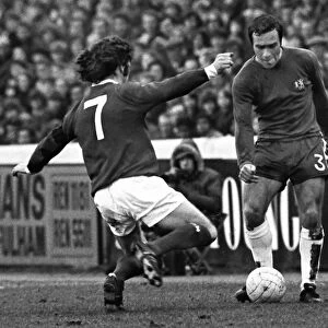 Chelseas Ron Harris is challeneged by Manchester Uniteds Willie Morgan