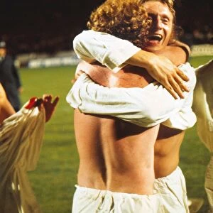 Denis Law celebrates with Billy Bremner after Scotland qualify for the 1974 World Cup