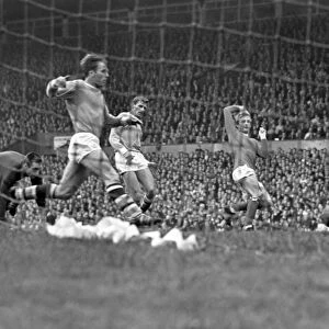 Denis Law scores the winning goal against Manchester City in 1966
