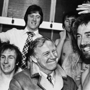 Dickie Guy and his Wimbledon teammates celebrate in the Elland Road changing rooms during the 1975 FA Cup