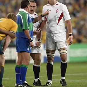 England captain Martin Johnson and referee Andre Watson exchange words during the 2003 World Cup Final