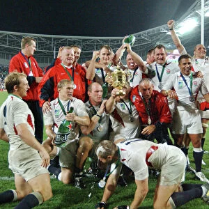 The England team celebrate after winning the World Cup in 2003