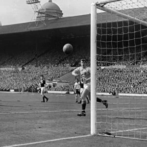 Englands Bobby Smith shoots past Scotland goalkeeper Frank Haffey - 1960 / 1 British Home Championship