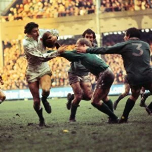 Englands Martin Cooper makes a break against Ireland - 1977 Five Nations