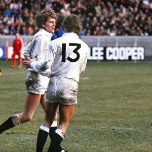 Englands Nick Preston celebrates his try against France with Clive Woodward - 1980 Five Nations