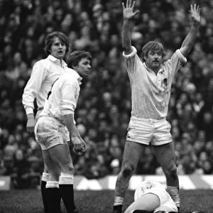 Englands Tony Neary calls for assistance for an injured teammate - 1980 Five Nations