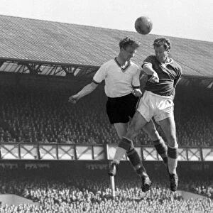 Evertons James Harris and Leeds Jack Charlton compete for a header