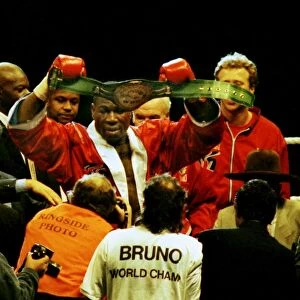 Frank Bruno celebrates winning the WBC title after defeating Oliver McCall