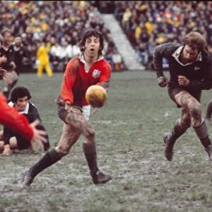 Ian McGeechan passes for the Lions at a muddy Athletic Park - 1977 British Lions Tour to New Zealand
