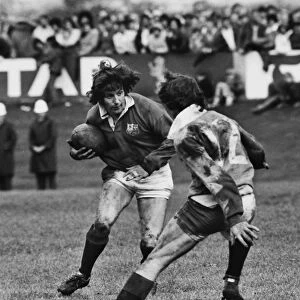 Ian McGeechan side-steps a tackle on the way to scoring for the Lions - 1977 British Lions Tour to New Zealand