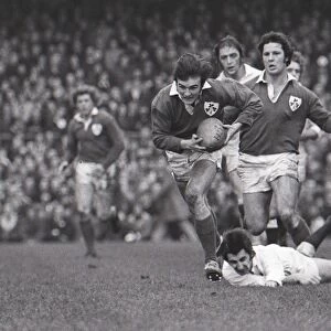 Irelands John Moloney makes a break during the 1974 Five Nations