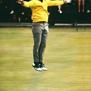 Jack Nicklaus leaps into the air after sinking the winning putt in the 1970 Open