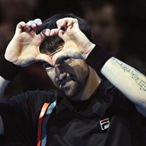 Janko Tipsarevic celebrates victory over Novak Djokovic at the ATP World Tour Finals