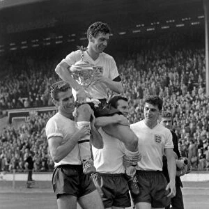Johnny Haynes is carried by his teammates after England beat Scotland 9-3 at Wembley in 1961