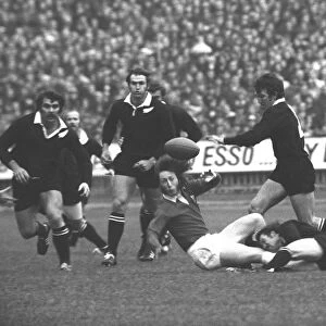 JPR Williams is tackled - Wales vs. All Blacks at Cardiff, 1973