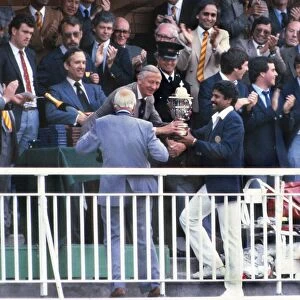 Kapil Dev is presented with the cricket World Cup in 1983